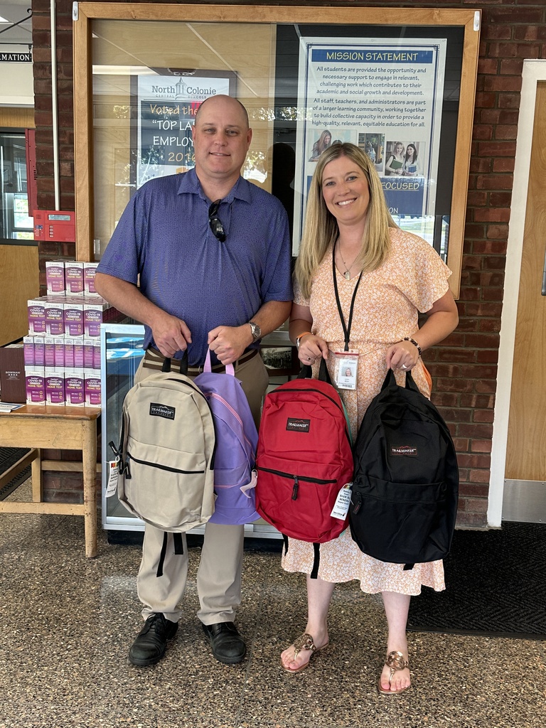 Director of Communications and Community Outreach, Ashley Miller, and a representative from NextStep Federal Credit Union