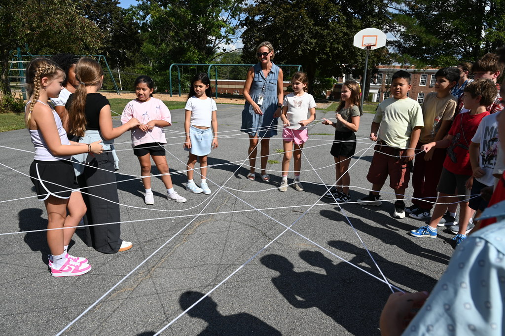 students working with string