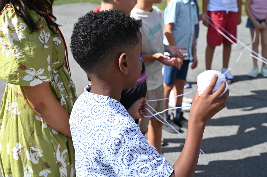 students working with string