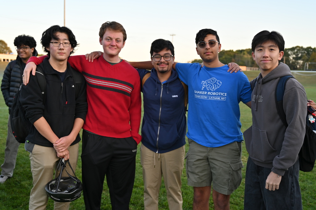 Five students pose together at Senior Sunrise.
