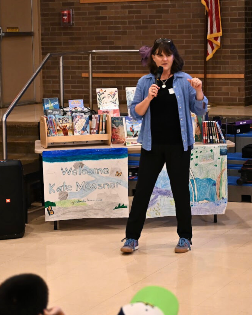 Kate Messner reading to Forts Ferry 5th graders 