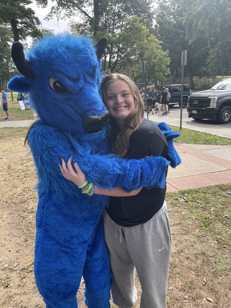 student with bison 