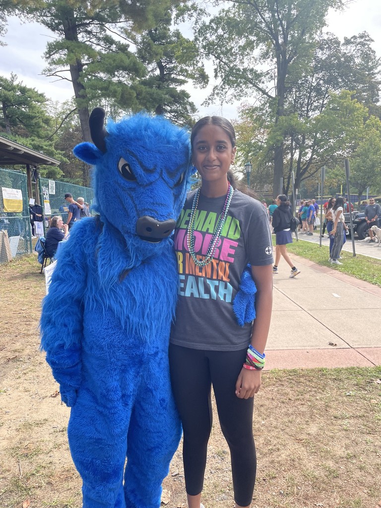 student with bison 