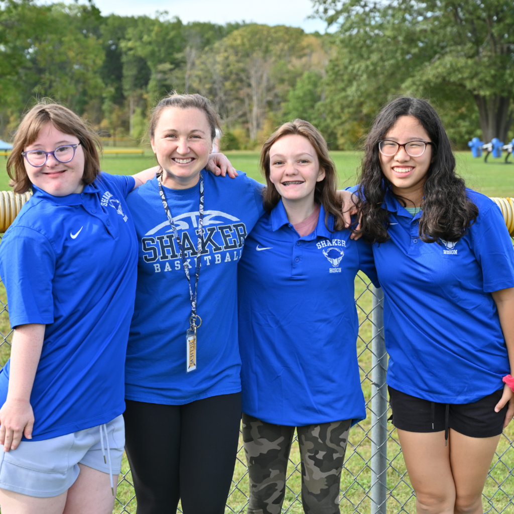 Three members of the Unified Bocce team with Coach Kelly