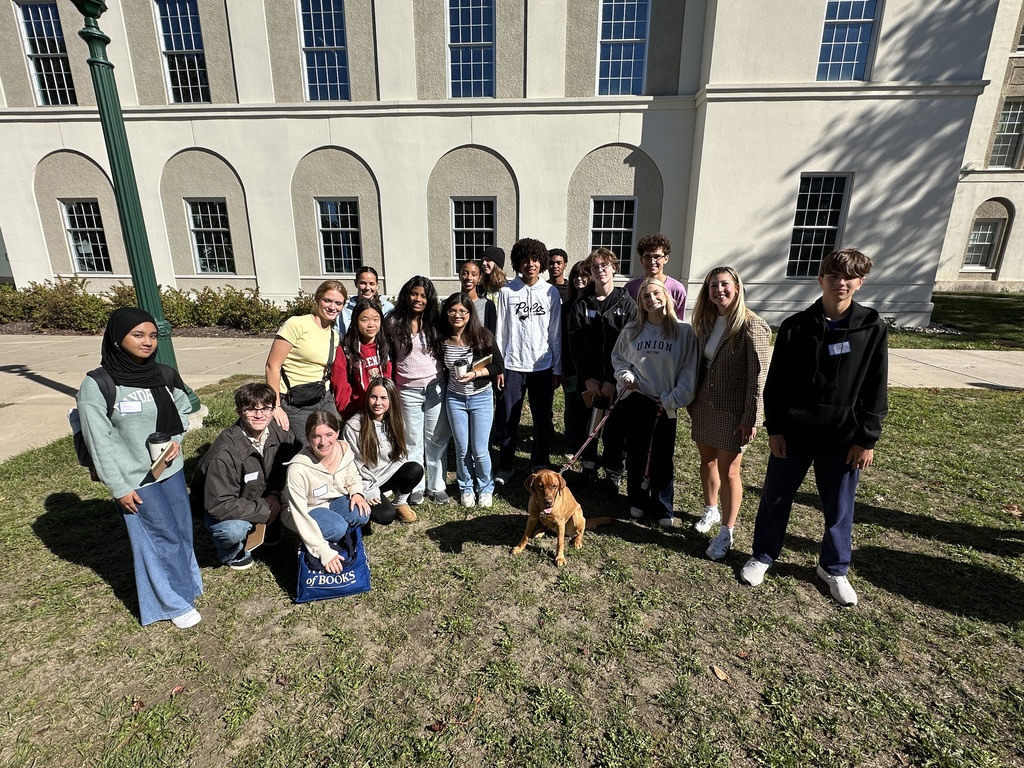 Shaker students pose with the Union mascot named Charger.