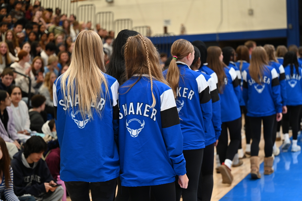 Shaker Cross Country team walking into the pep rally
