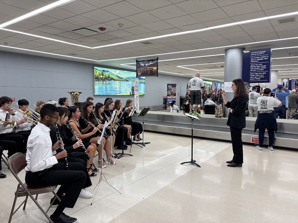 students playing instruments at honor flight ceremony 