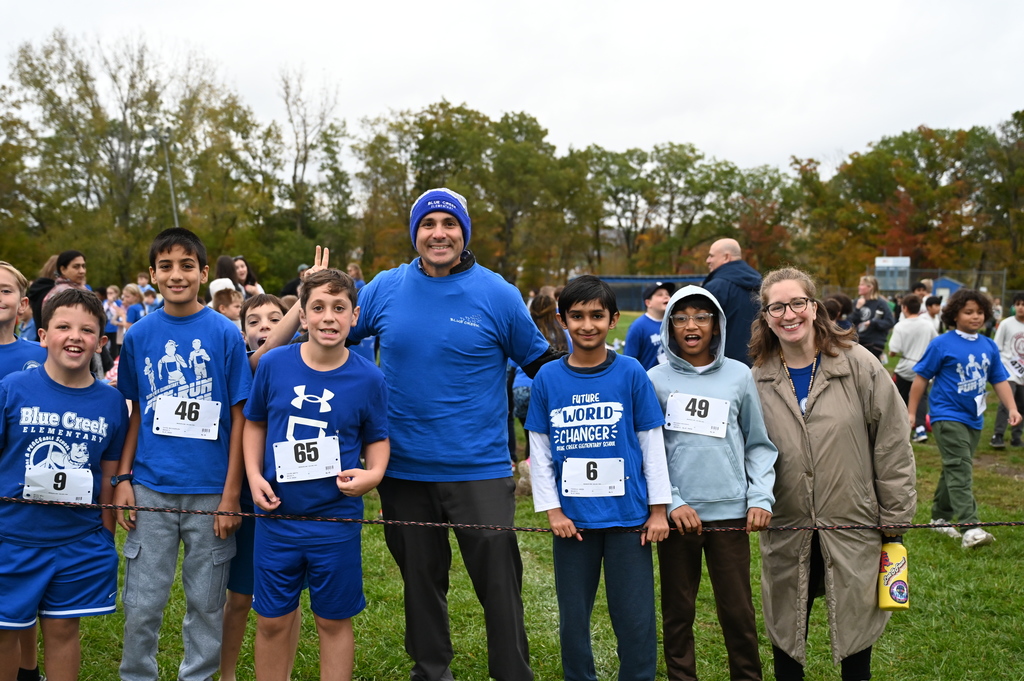 Principal Turcio with Blue Creek students