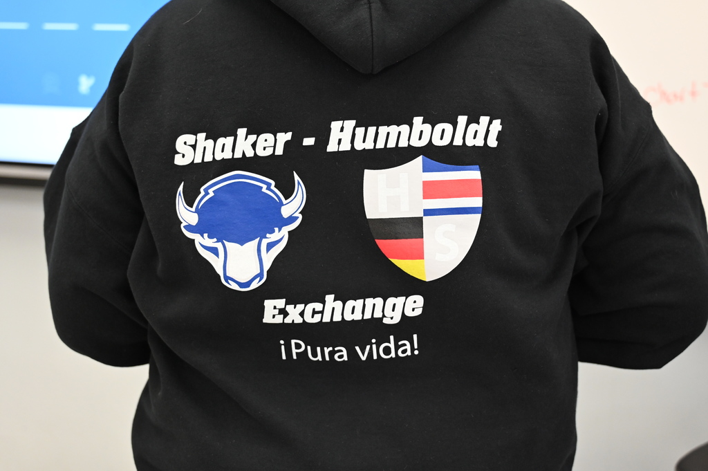 An image of a sweatshirt with the two logos involved in the exchange program.