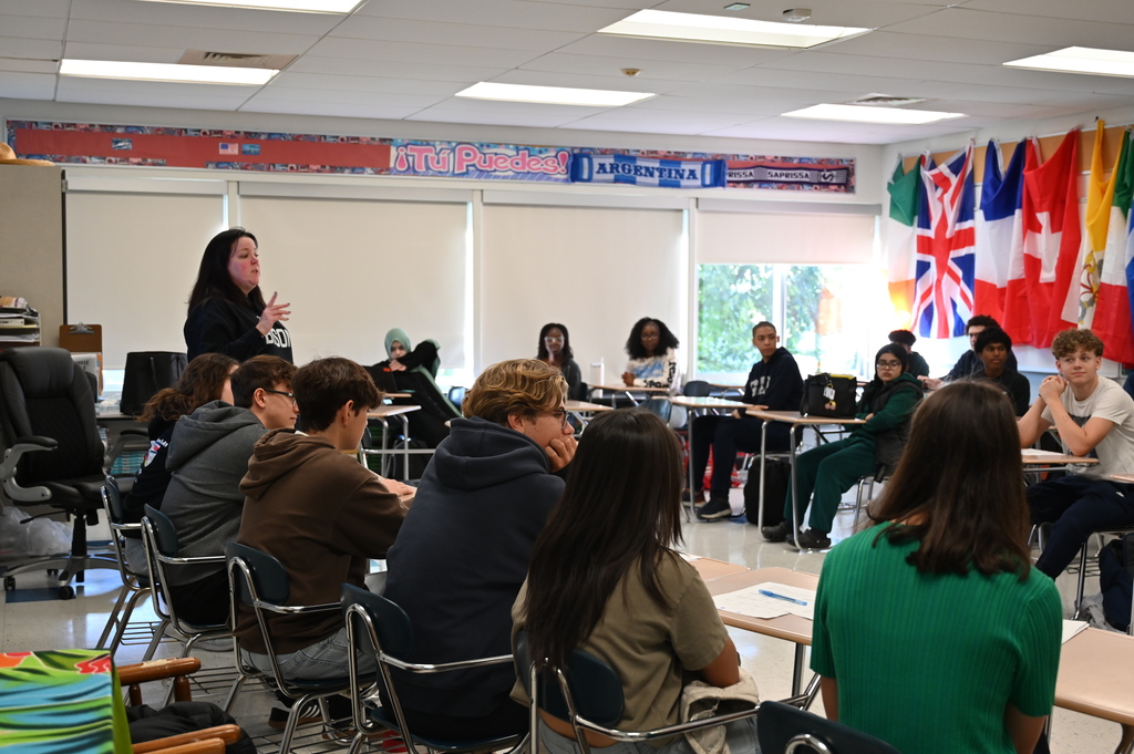 Costa Rican exchange students meet with students in Spanish classes at Shaker High School.