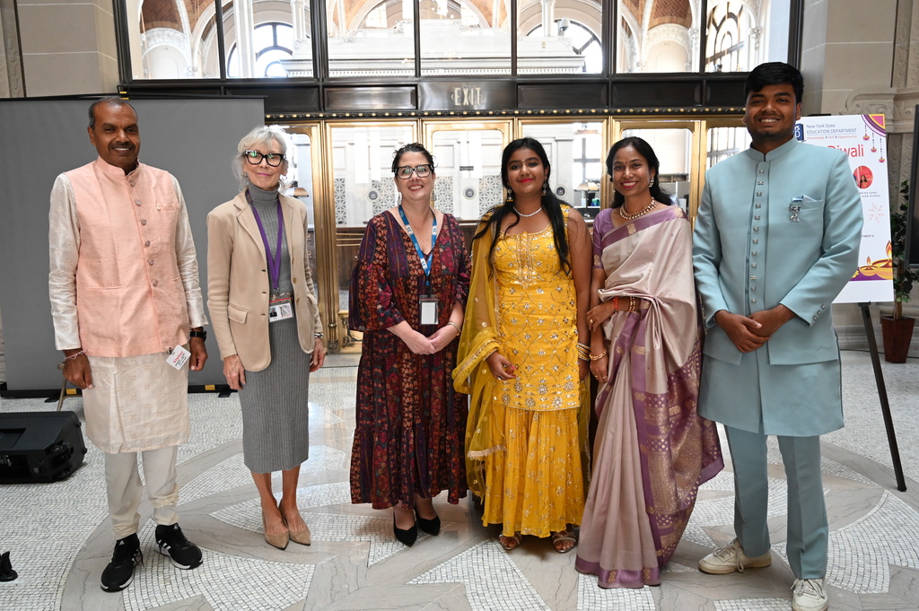 The Garg family poses with Superintendent Kathleen Skeals and Board of Education President Linda Harrison.