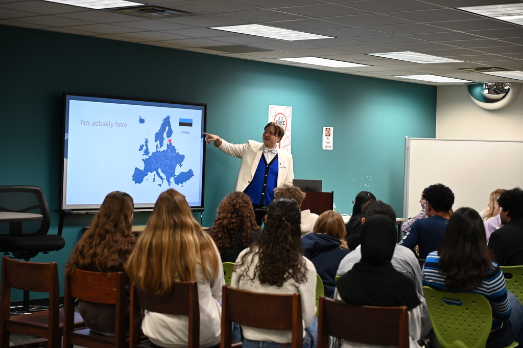 Students watching presentation from delegate