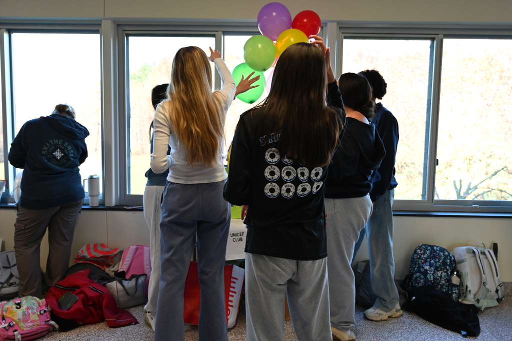 UNICEF Club building the house from UP