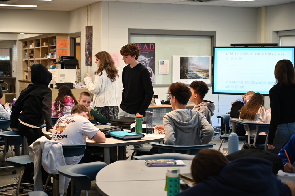 Students teaching kids