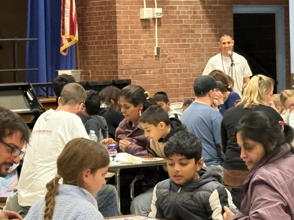 Blue Creek principal, Mr. Turcio, emcees Bingo Night