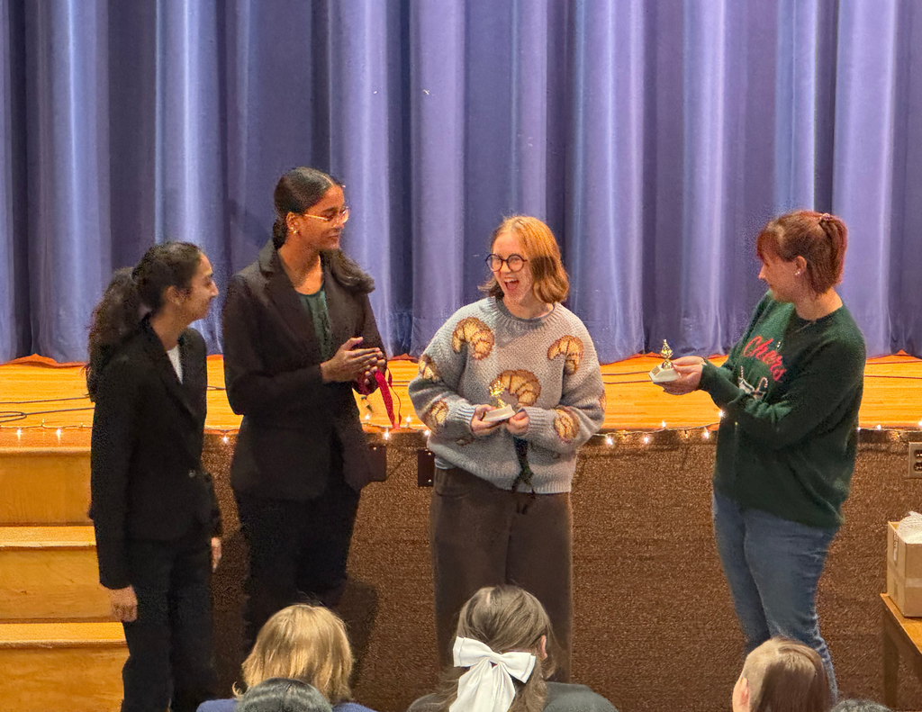 Speech & Debate Team Winning an Award