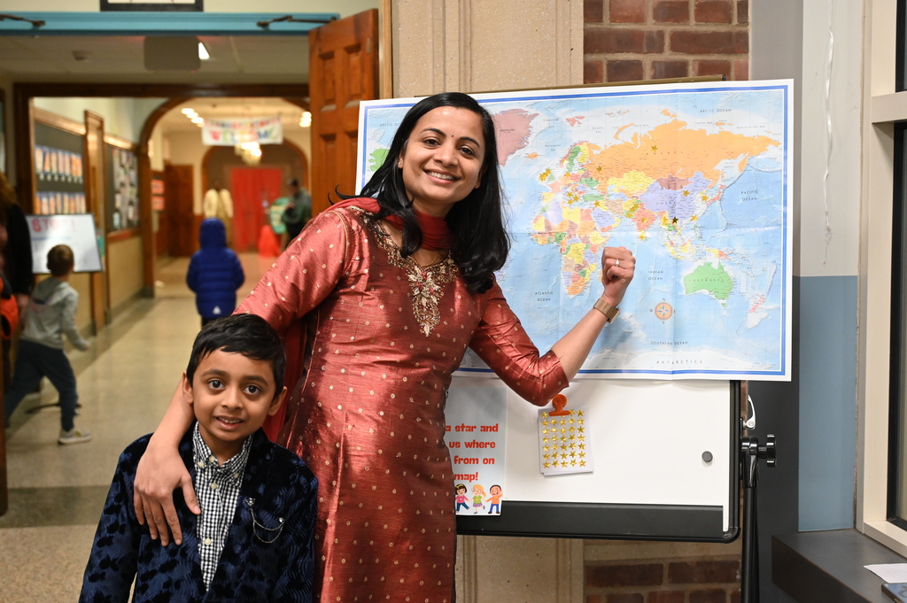 Loudonville family shows where they are from on a map