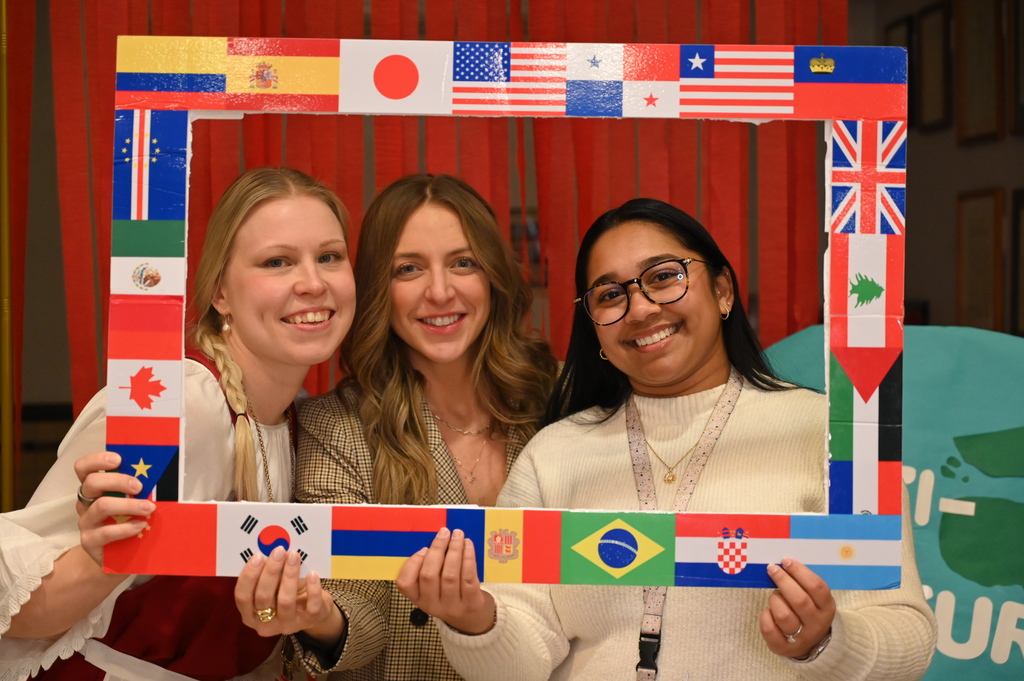 Loudonville faculty members take picture at multicultural photo booth