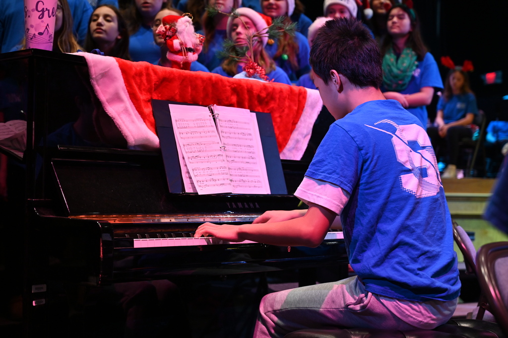 Shaker Middle School student plays piano