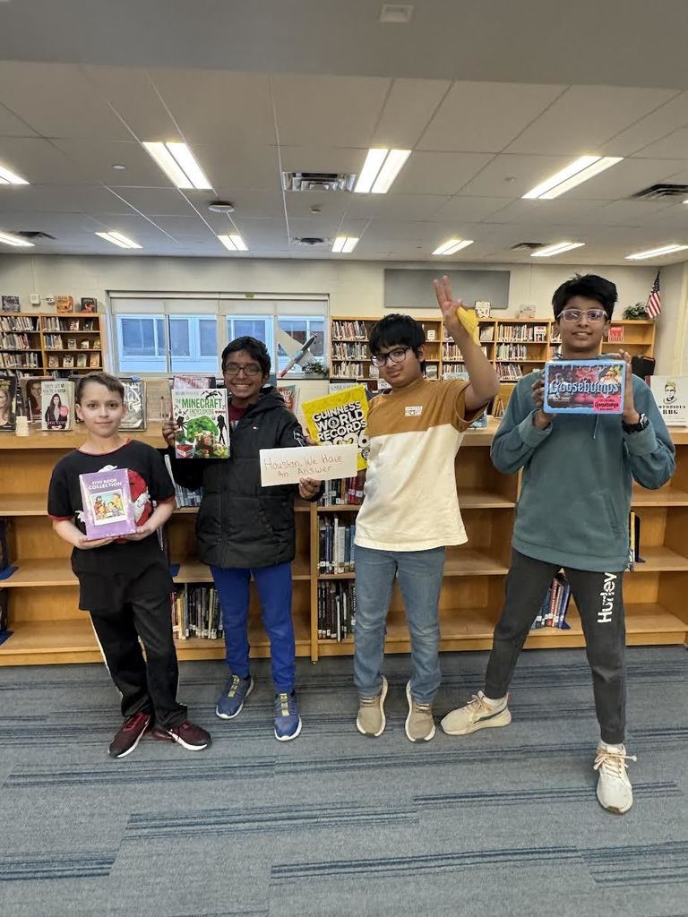 library trivia winners - houston we have an answer, four students happy