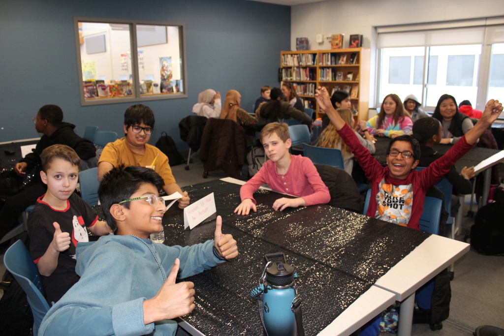 houston we have an answer five team members giving thumbs up