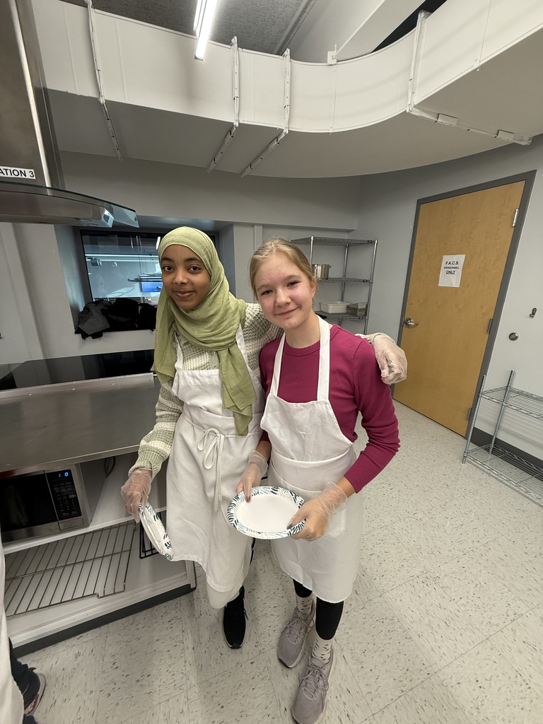 Crepe day at shaker middle school with two students getting ready to make a crepe