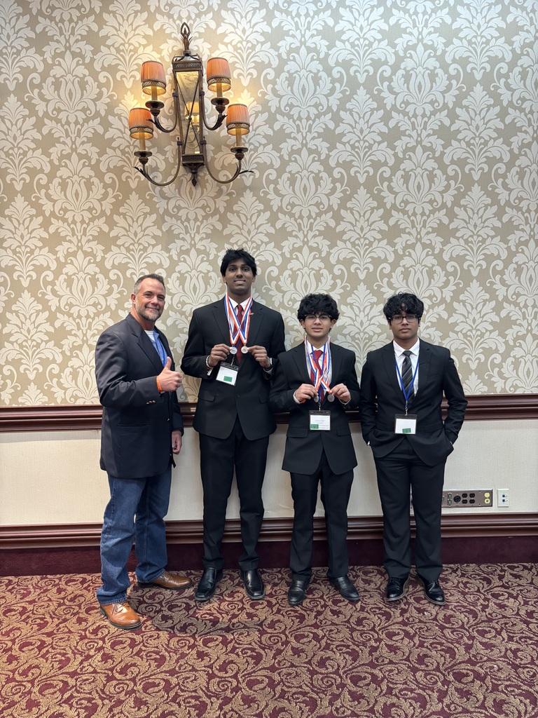 DECA members and advisor Mr. James Berti