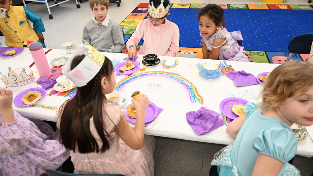 Students chat over tea
