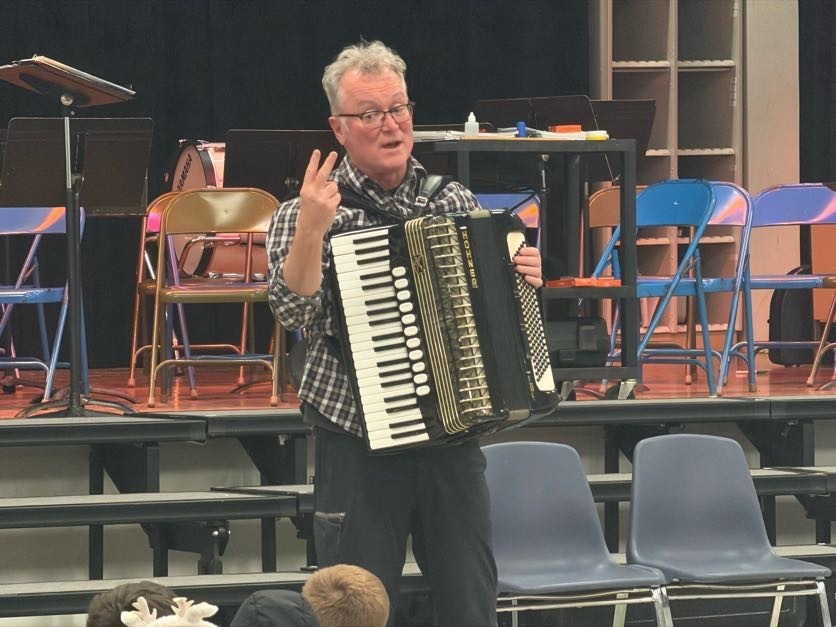 Accordion playing at latham ridge for irish heritage presentation