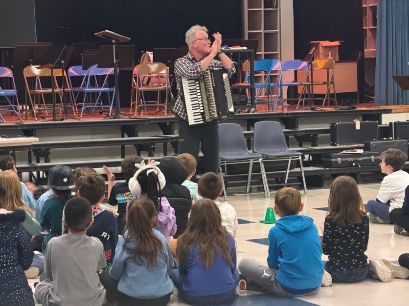 Accordion playing at latham ridge for irish heritage presentation