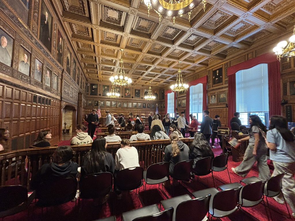 Students look around the historic Albany Criminal Court