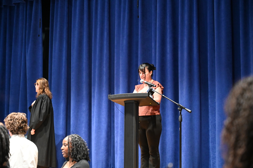 North Colonie Food Service Employee and recently Naturalized citizen, Mariana Zahopoulos leads the Pledge of Allegiance