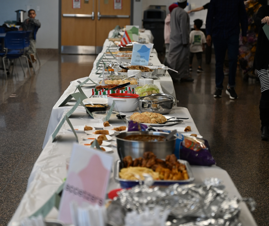 One of the tables lined with food at event