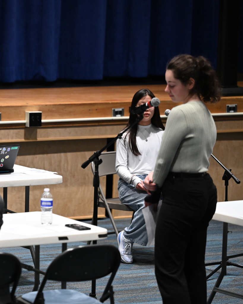 Student questions witness