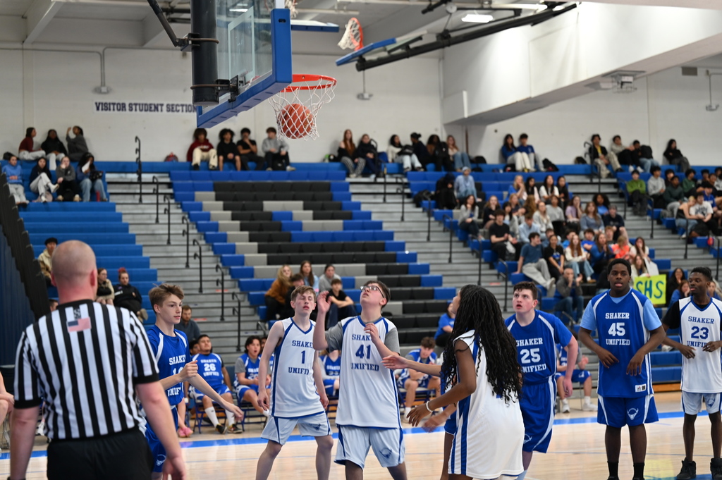 Unified players watch the ball go in the basket