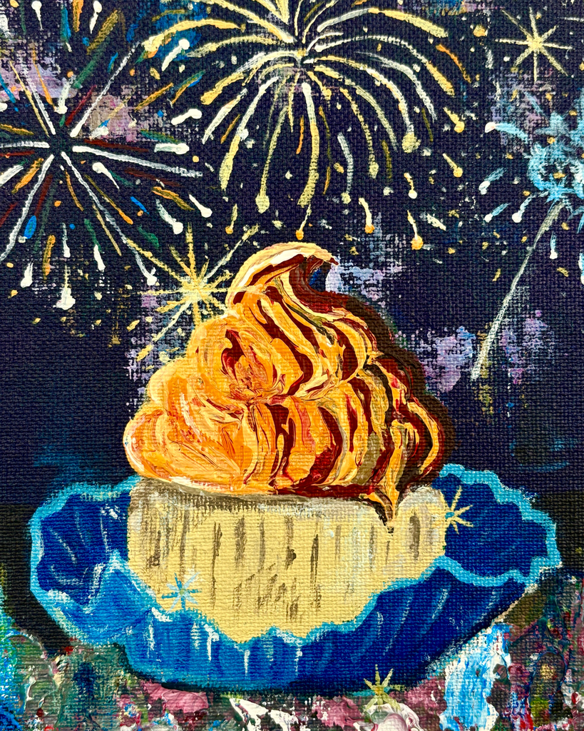 Cupcake with a flower and firework background