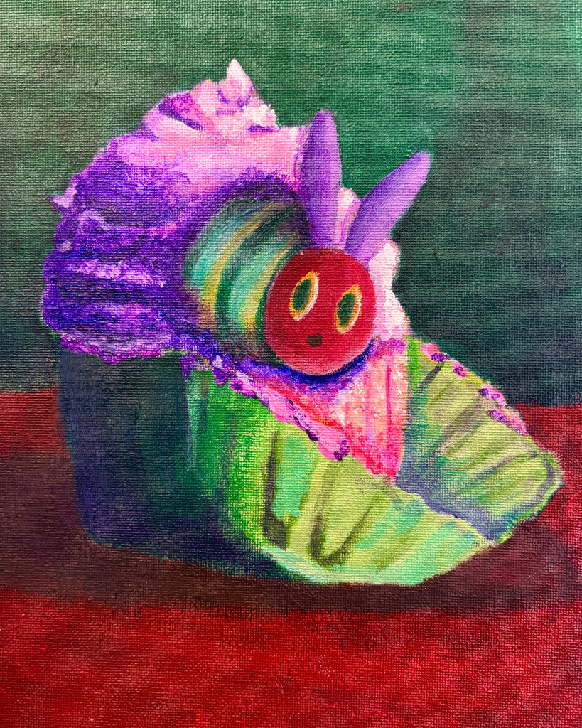 Cupcake with the Very Hungry Caterpillar coming out of it