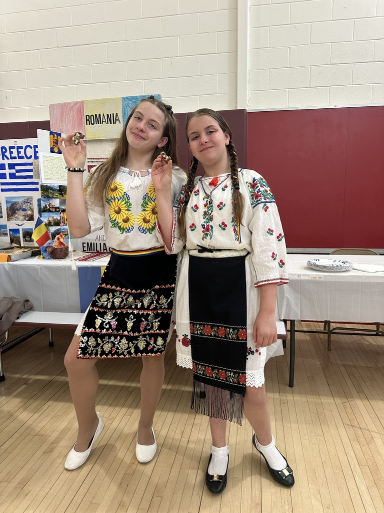 students posing at table