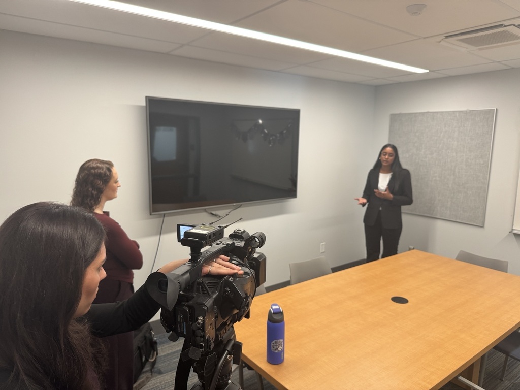 students filming with speech and debate