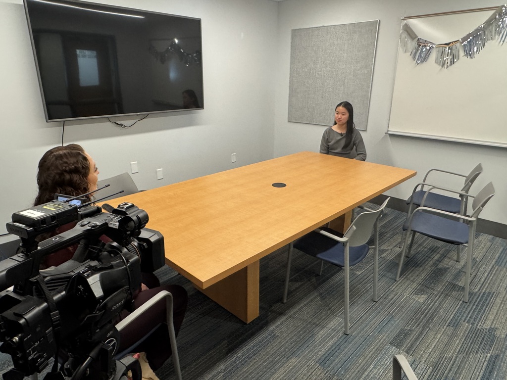 students filming with speech and debate