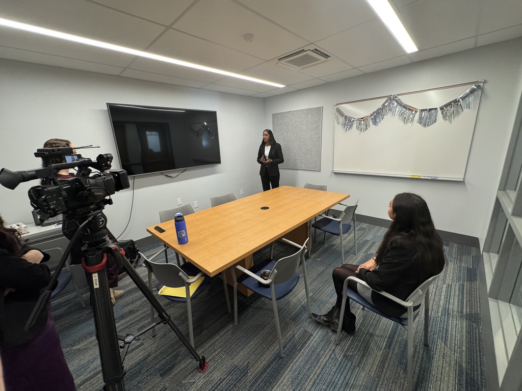students filming with speech and debate