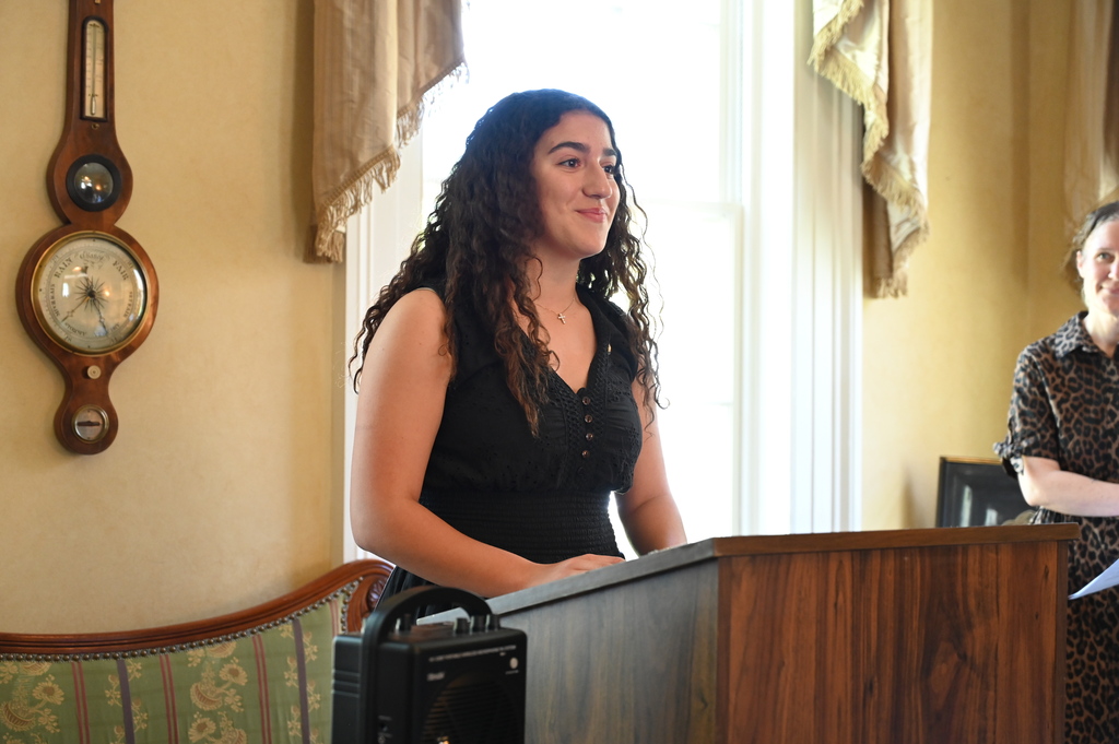Daughters of the American Revolution Good Citizen Award recipient Joelle Hannoush stands at the podium and speaks after receiving her award.