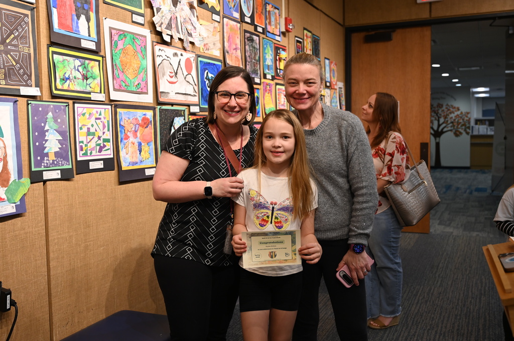 teacher student and guardian at art show event