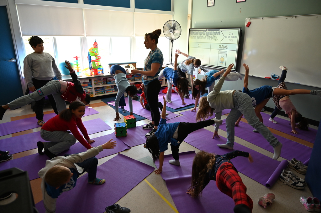 students doing yoga