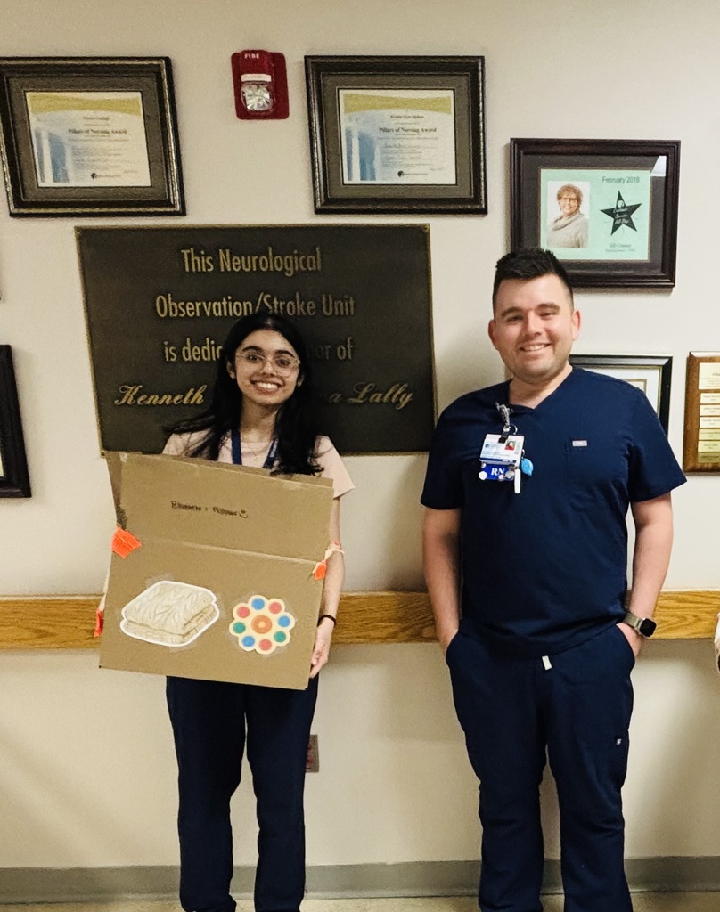 Giving back to the community, student holding fidget toys they collected for donations