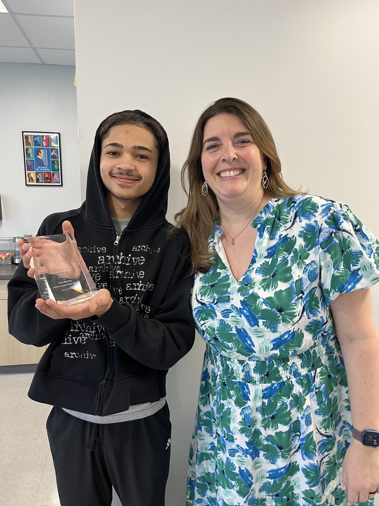 Mrs. Kim Murray posing with a student after being honored by UAlbany as an exceptional mentor.