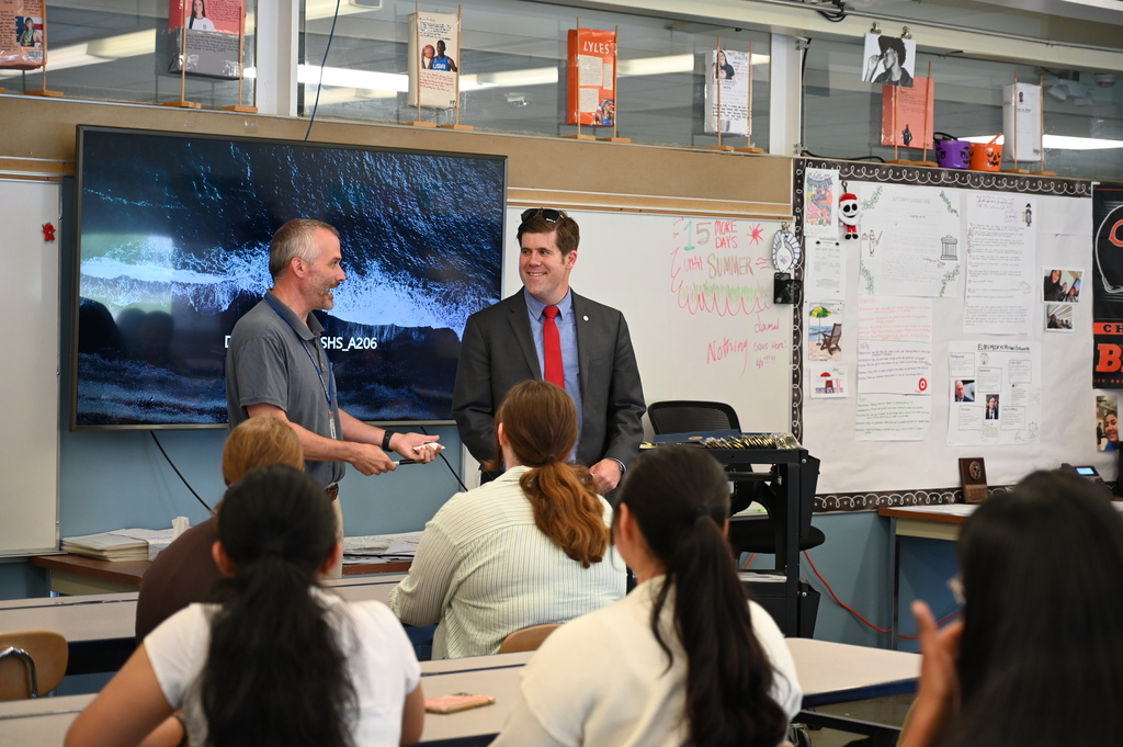 Speech and Debate Advisor Christopher VanDerBeck with Deputy County Executive Mike McLaughlin