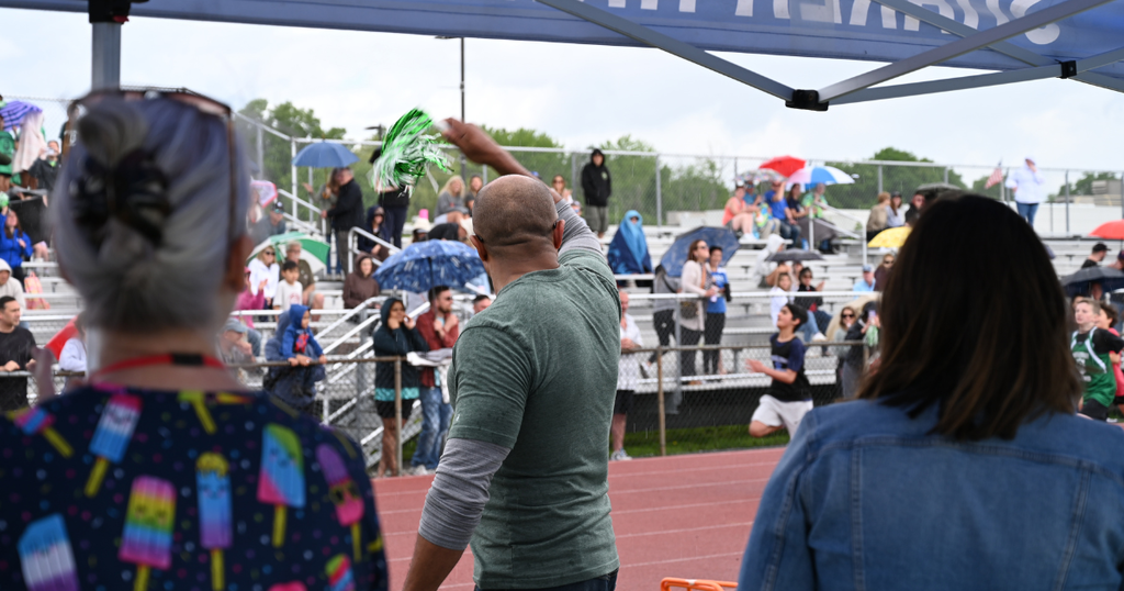 Dr. Parker cheering on students