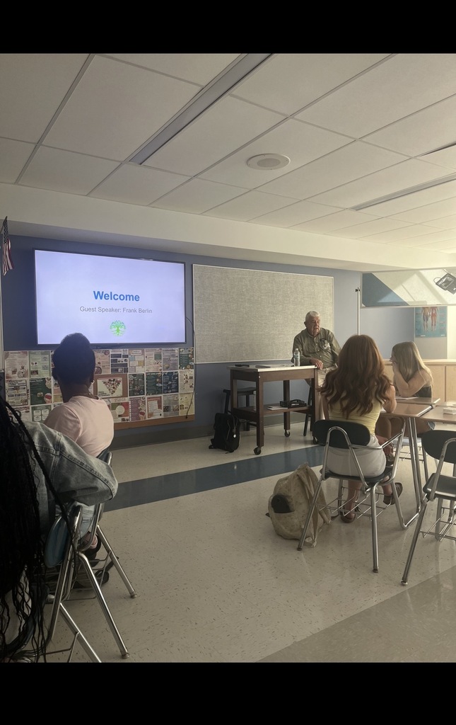 Mr. Berlin talking to students