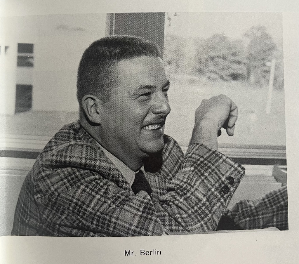 Mr. berlin photo in the yearbook of him smiling
